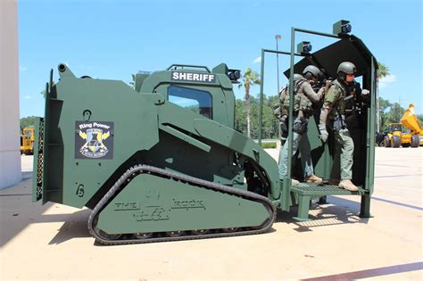 armored cat skid steer|armored swat vehicle.